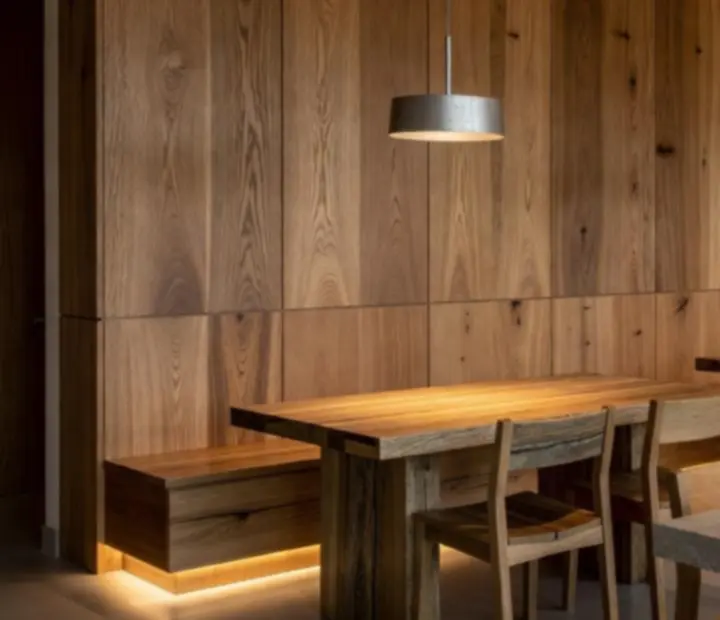 Eco-conscious interior materials including timber, soft textiles, and stone at The Grand River Room